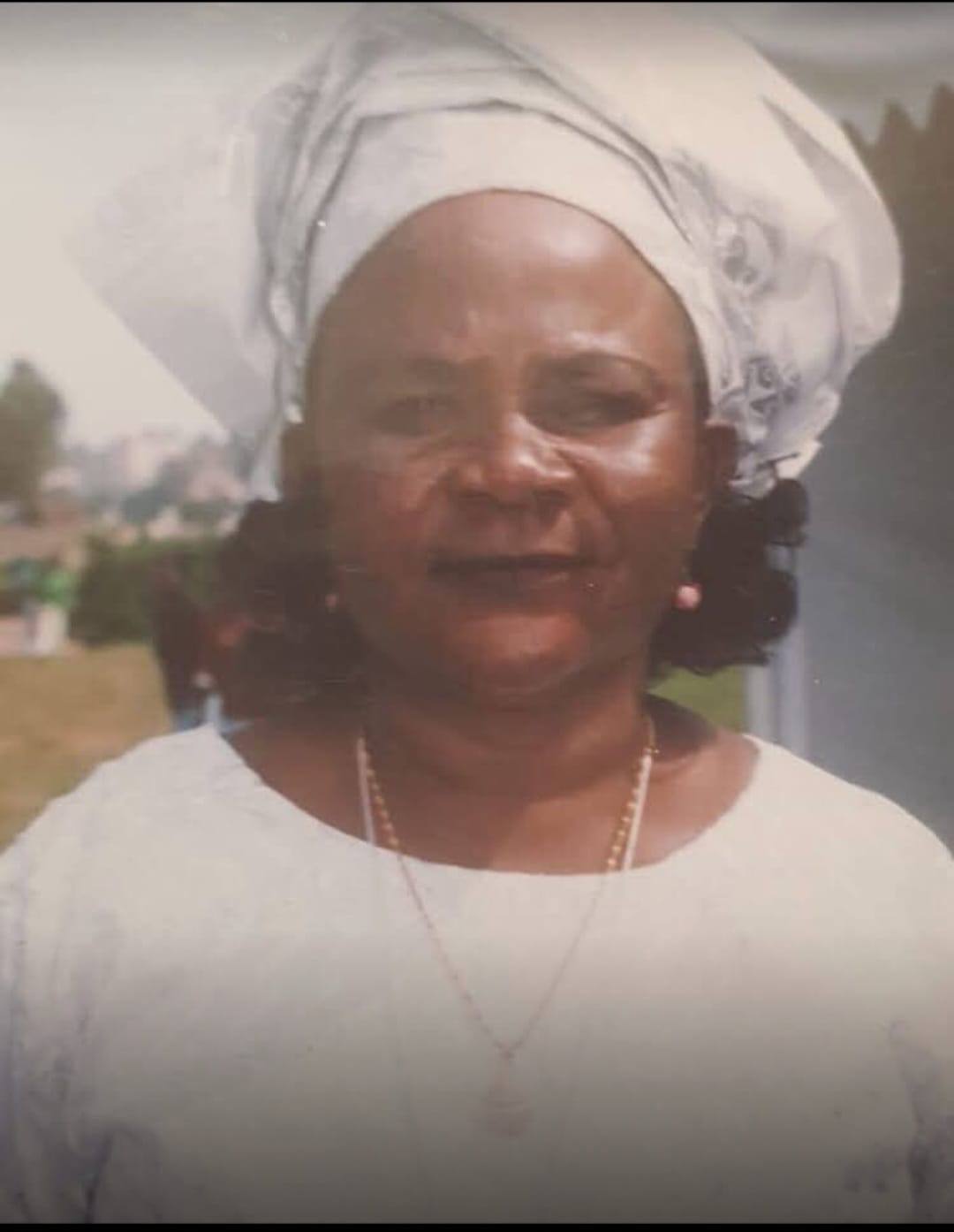 Hajji Musa Mutagubya at the site of the houses currently under reconstruction